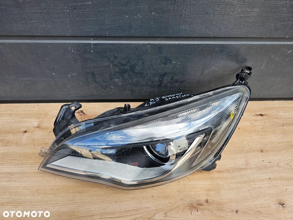 LAMPA LEWA PRZEDNIA LEWY PRZÓD OPEL ASTRA J BI-XENON EUROPA DEMONTAŻ ORYGINAŁ PRZED LIFT PO LIFT 13253650 - 1