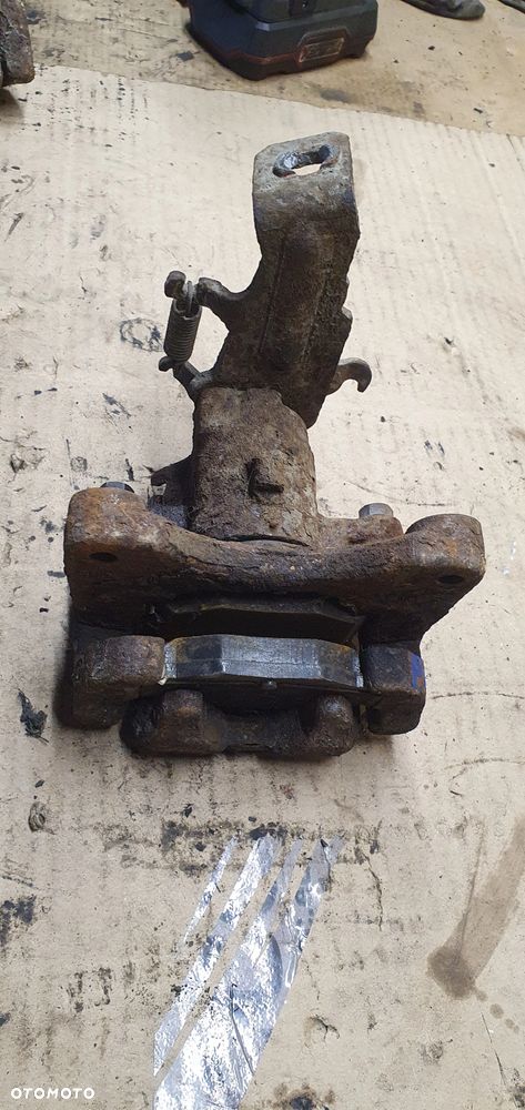 Zacisk hamulcowy lewy tył tylny lewy Nissan Almera Tino - 3