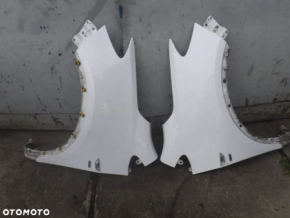 Opel  Mokka 12-16 blotnik przod lewy prawy GAZ bialy - 1