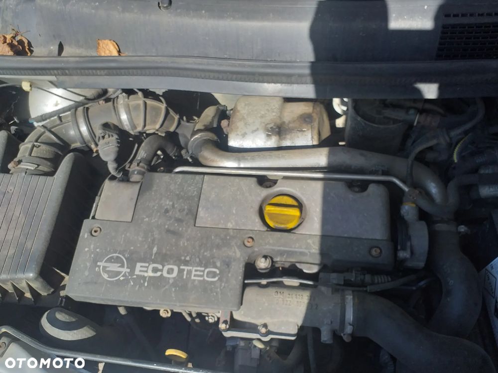 Auto na części - Opel Zafira 116KM benzyna 1999 Silnik Skrzynia Drzwi Maska Klapa Błotnik Zderzak Lampa Szyba Klamka Lusterko Deska Kokpit - 4