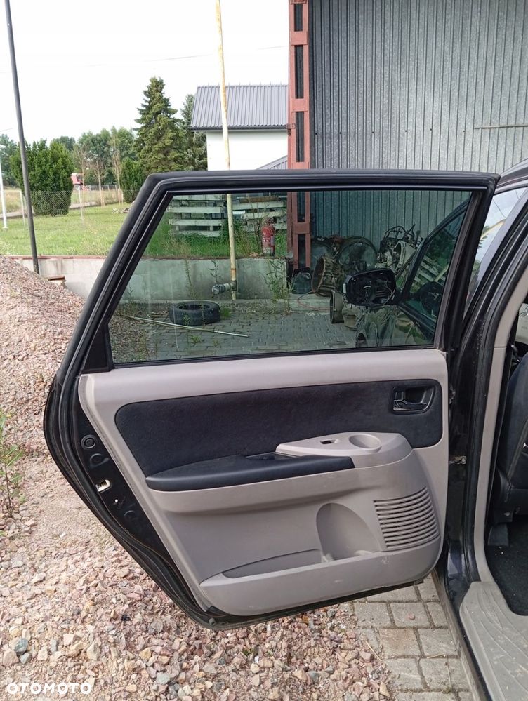 MITSUBISHI GRANDIS DRZWI LEWE TYLNE TYŁ GOŁE - 2
