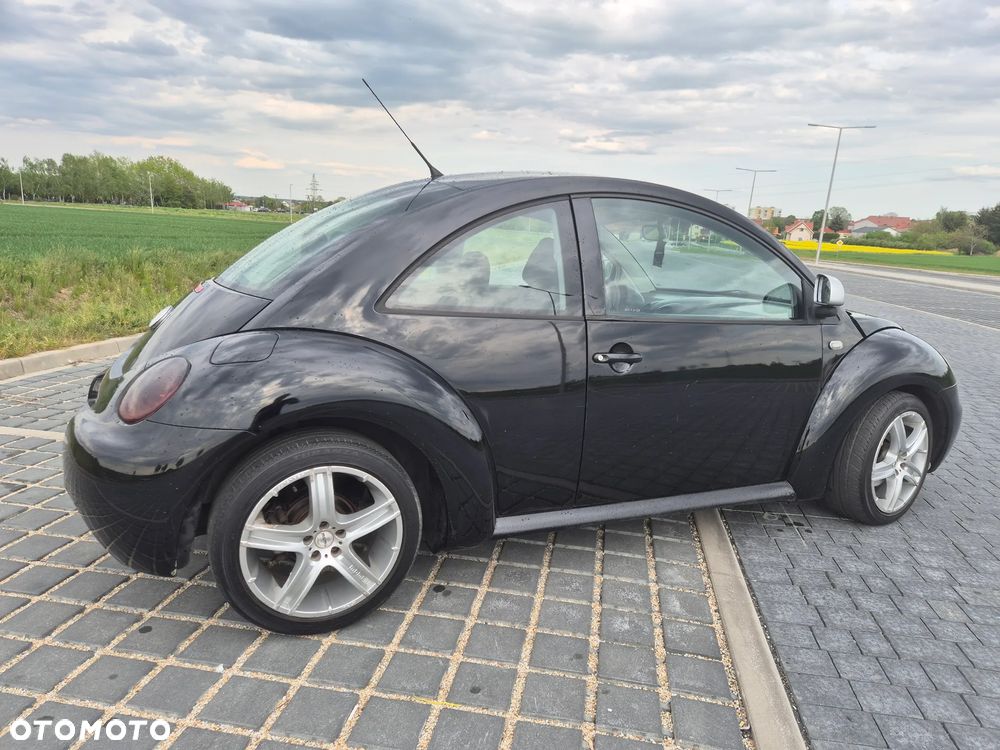 Volkswagen New Beetle 2.0 - 4
