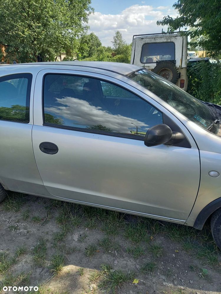 części OPEL CORSA C hatchback 3drzwi 1.0 benzyna 2002r. Srebrny DRZWI PRZÓD prawe lewe - 1