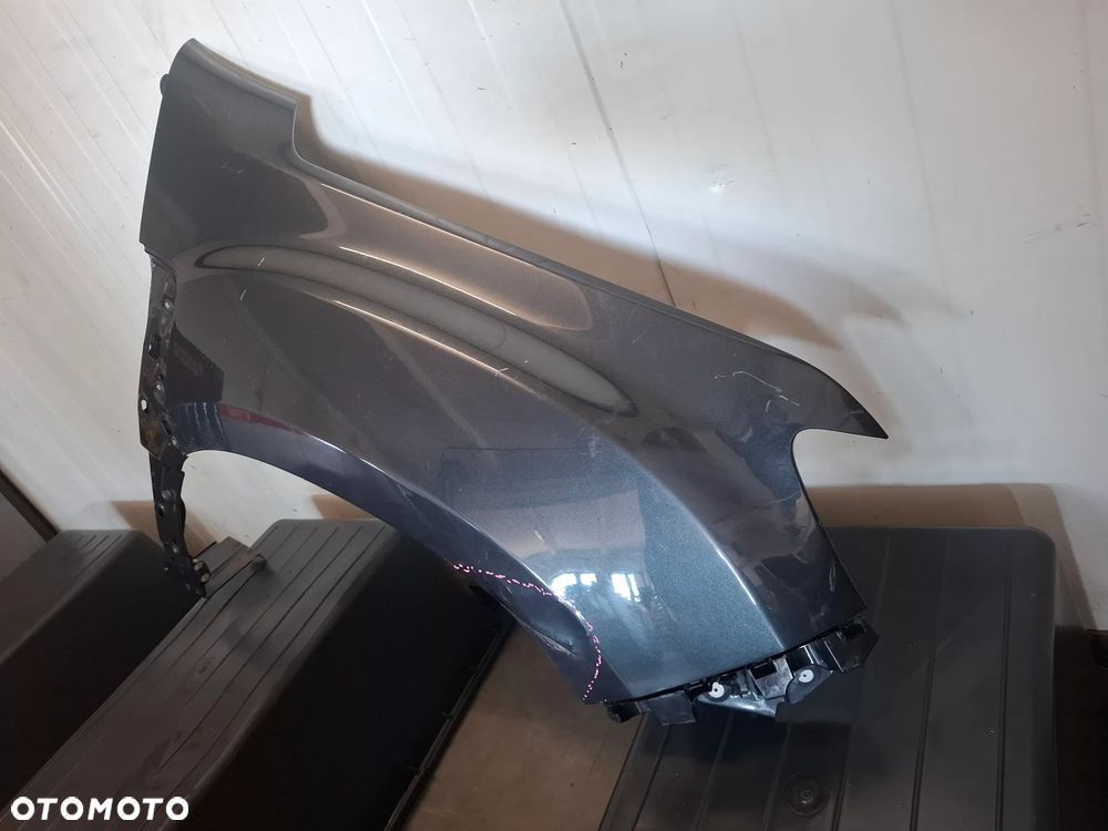 Błotnik prawy przód Dacia Duster 2019 rok - 4