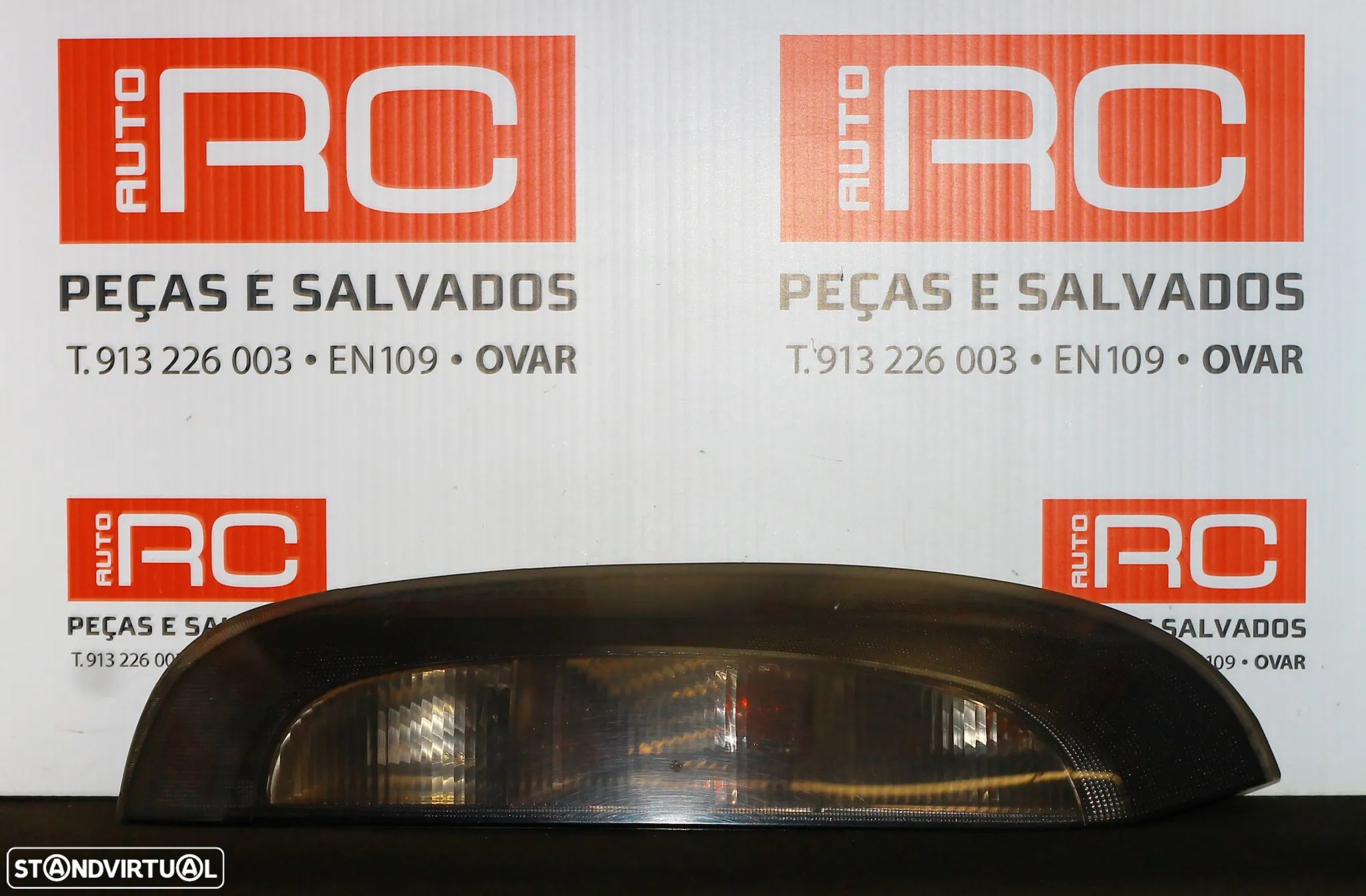 FAROLIM ESQUERDO OPEL CORSA C - 1