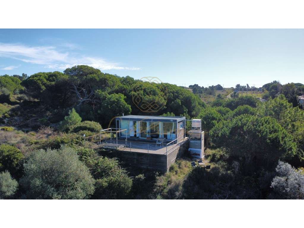 Lote de Terreno com casa Modular Vista de Mar - Grande imagem: 2/27