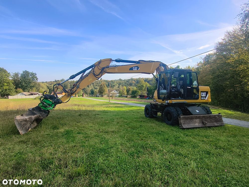 Caterpillar M313D - 15