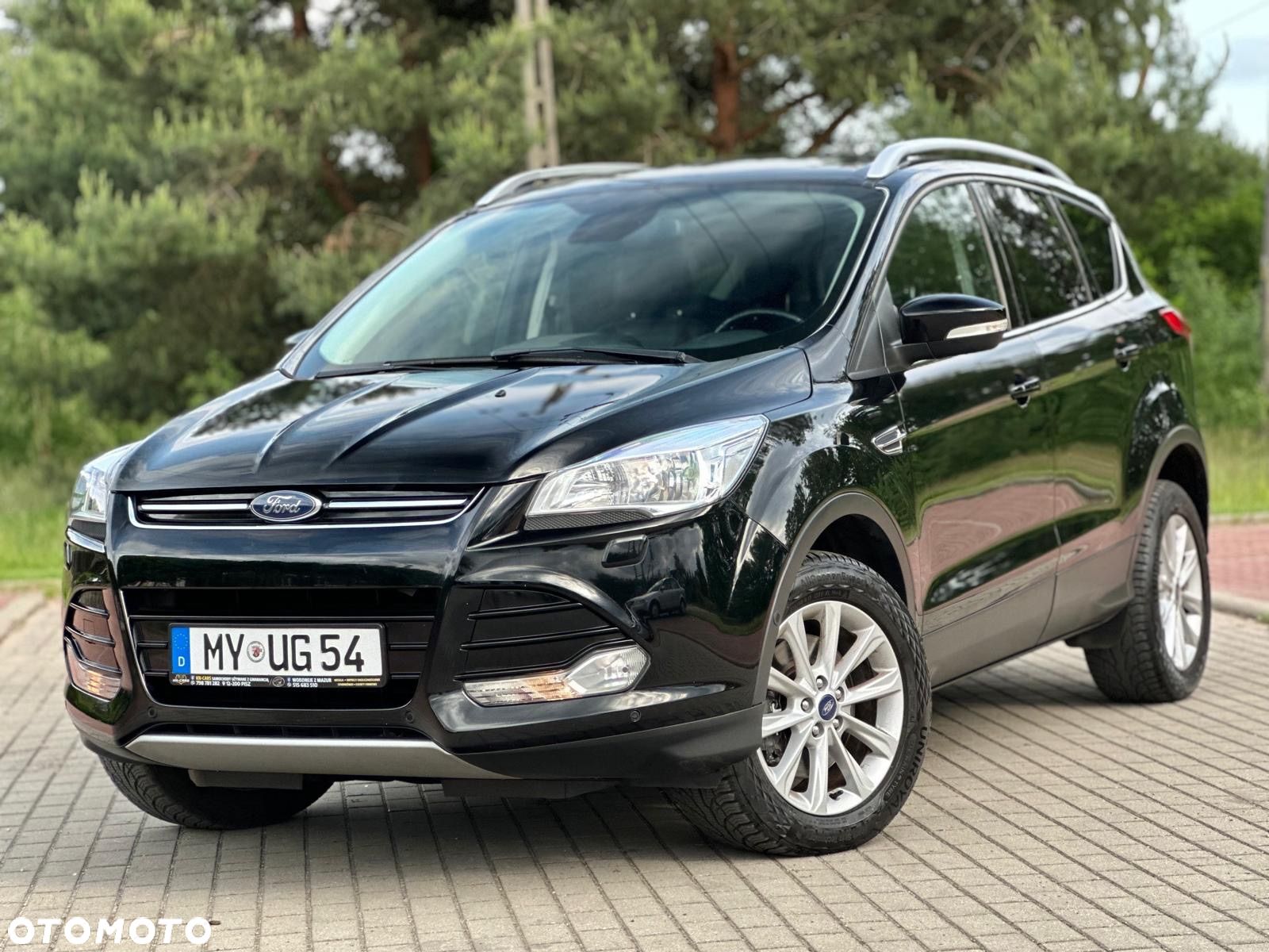 Ford Kuga 2.0 TDCi AWD Titanium - 1