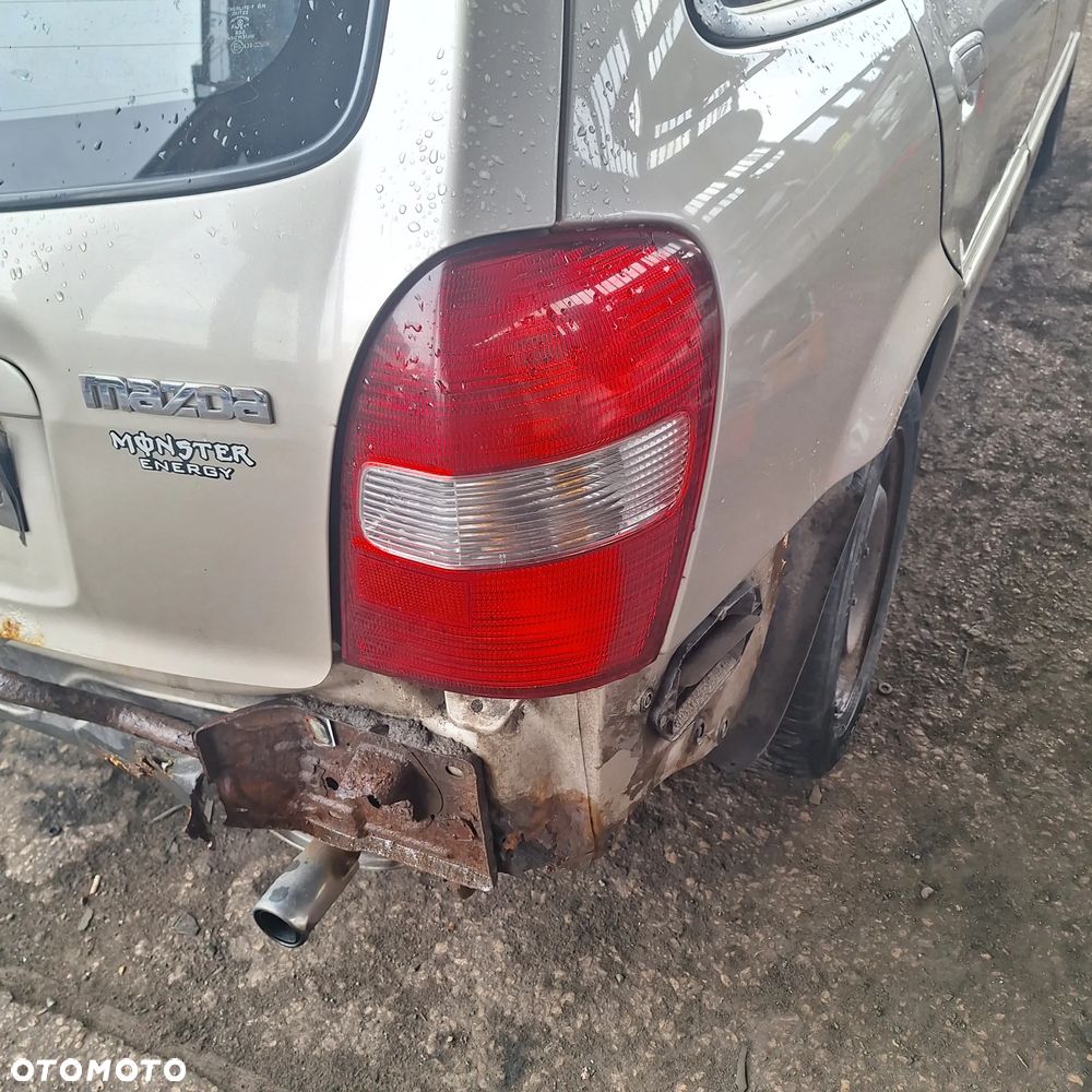 LAMPA PRAWA LEWA TYL MAZDA 323 F BJ HB - 1