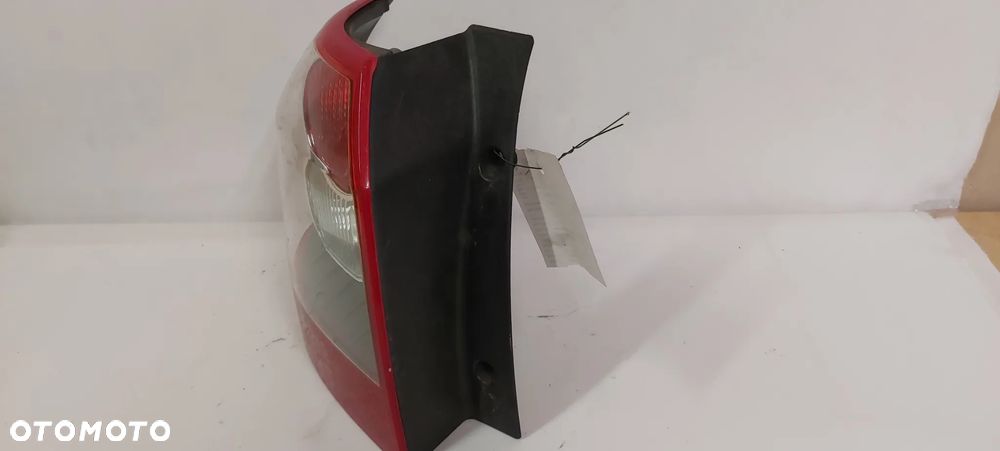 .  LAMPA TYL TYLNA LEWA LAND ROVER FREELANDER 2 - 2