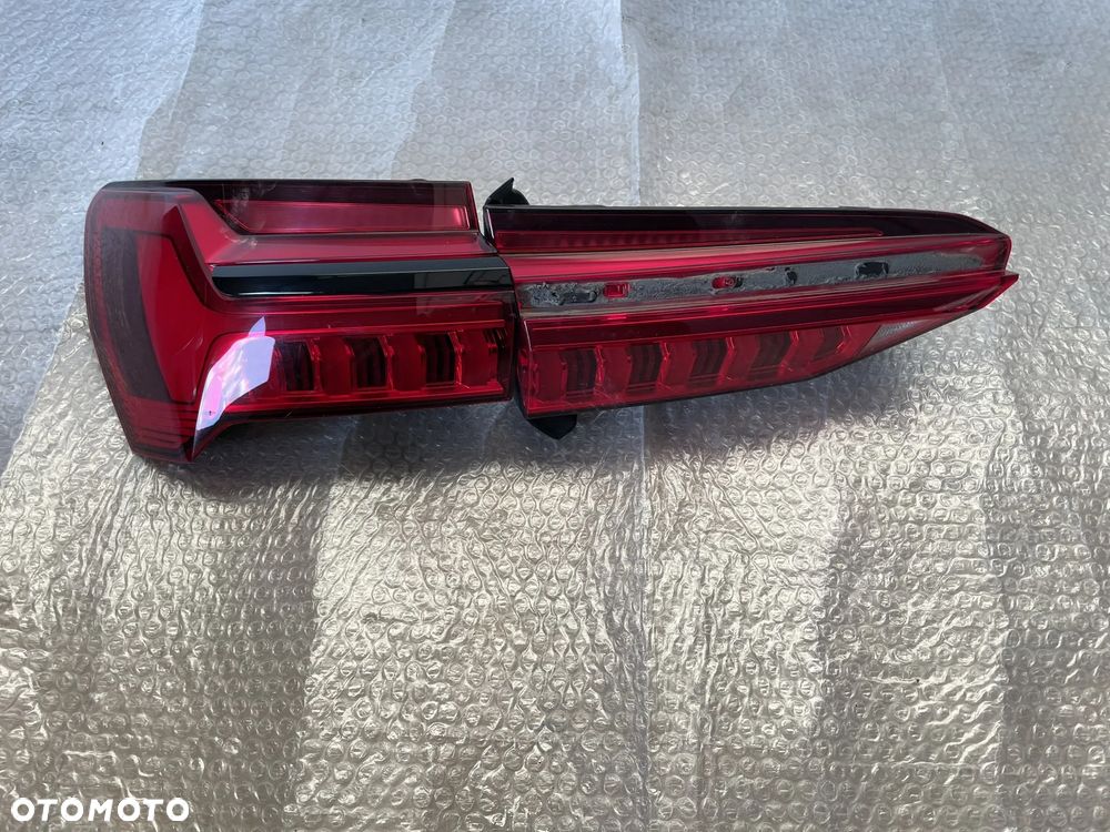 Audi A6 C7 4K sedan lampa tył lewa w klapę i w błotnik - 1