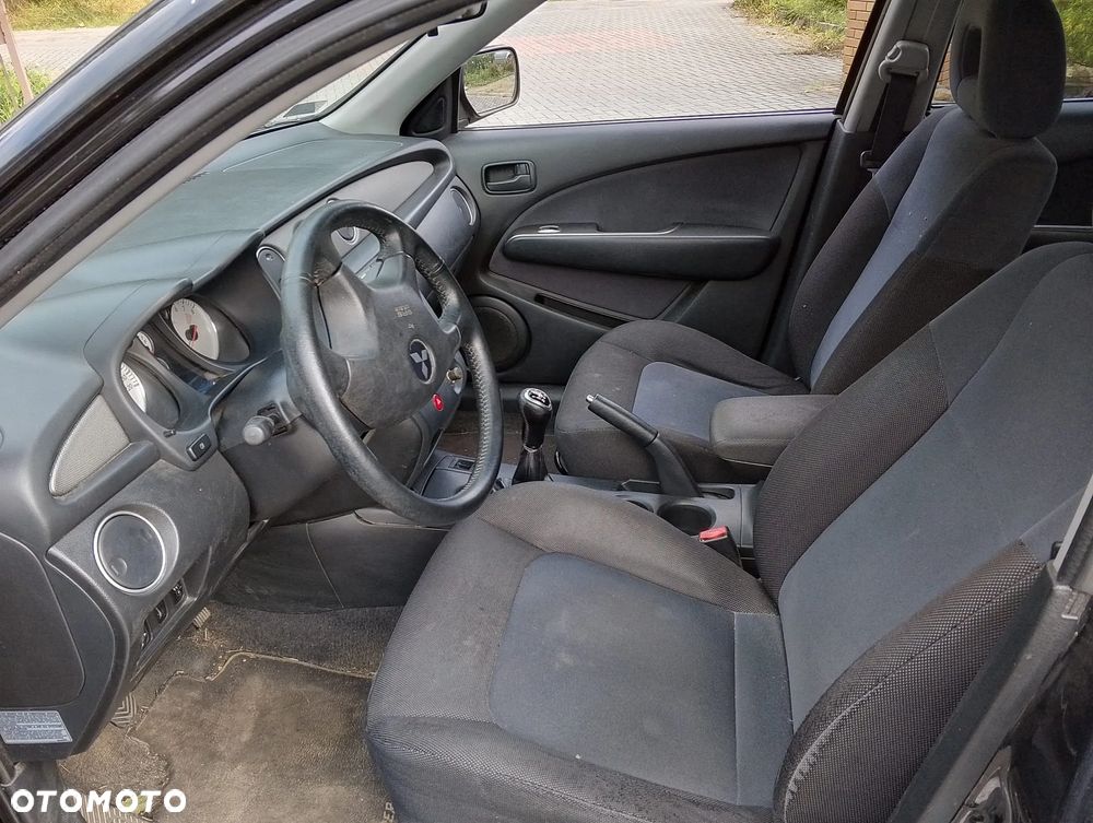 Mitsubishi Outlander CU0W (I) (01-06.) 2.0 B 136KM. Silnik 4G63 Skrzynia F5M42 lakier X42A.Cały na części. GWARANCJA !!!  Przód Tył Zestaw Komplet Drzwi Klapa Zderzak Błotnik Maska Grill Atrapa Szyba Pas Lampa Lusterko Boczki Fotel Kanapa Kokpit Deska Rozdzielcza Przełącznik Włącznik Sterownik Przewody Wiązka Instalacja Moduł Komputer Czujnik Listwa Pompa Alternator Wtryski Głowica Rozrusznik Kompresor Sprzęgło Dwumas Silnik Skrzynia ABS Klimatyzacji Paliwa Wspomagania Kolektor Turbina Przepustnica Zawór Chłodnica Koło Hak Belka Sanki Zawieszenie Mcpherson Półoś Amortyzator Wydech Tłumik Zacisk Most - 9