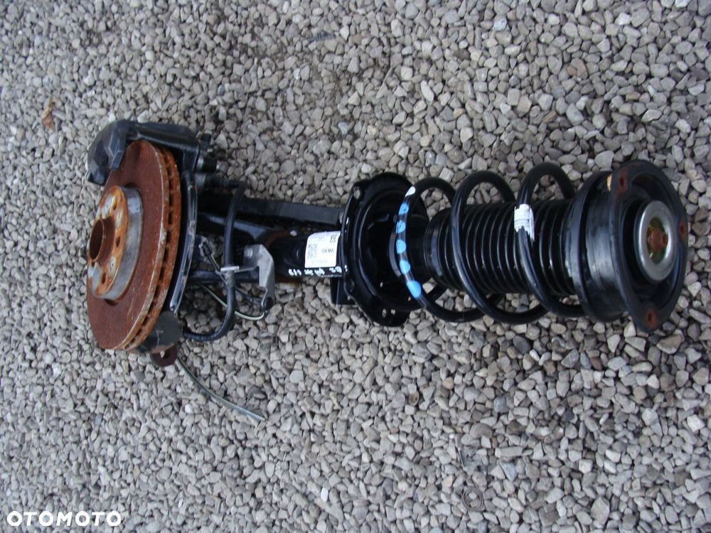amortyzator zwrotnica lewa vw taigo kamiq arona 2q0413031dr - 2