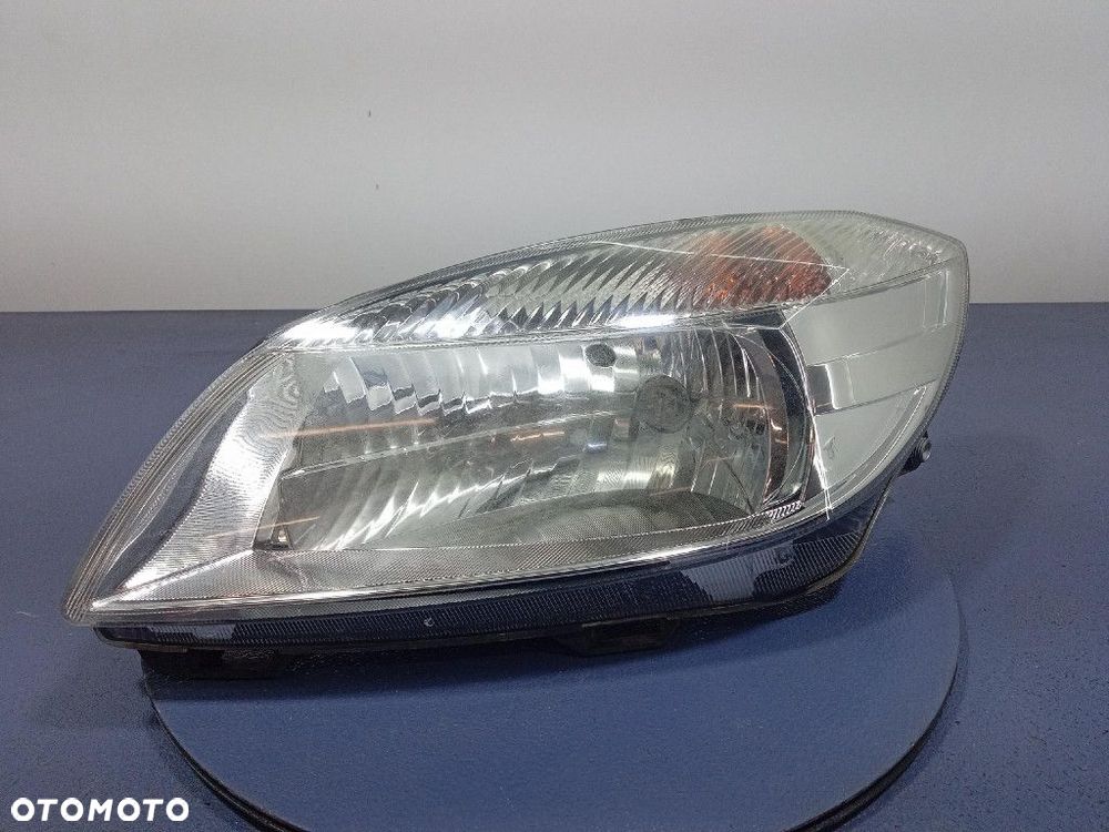 SKODA FABIA II 5J LIFT 10-14 REFLEKTOR LEWY PRZÓD LAMPA 20-E322 - 1