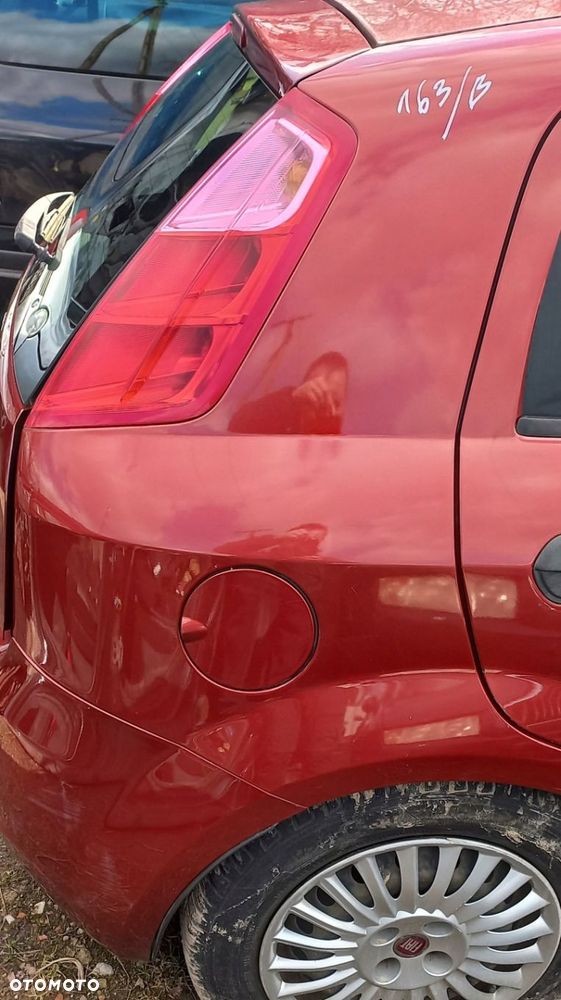 BŁOTNIK TYLNY PRAWY FIAT GRANDE PUNTO 163/B