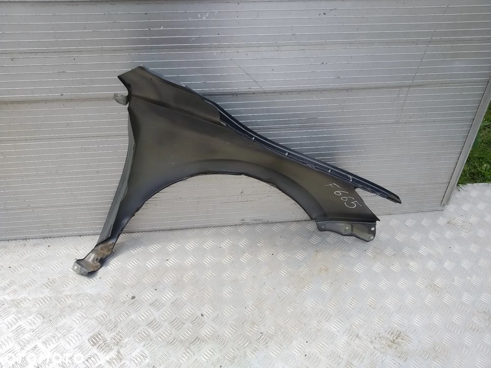 F665/H32 LEWY BŁOTNIK TOYOTA CAMRY 2015- - 2