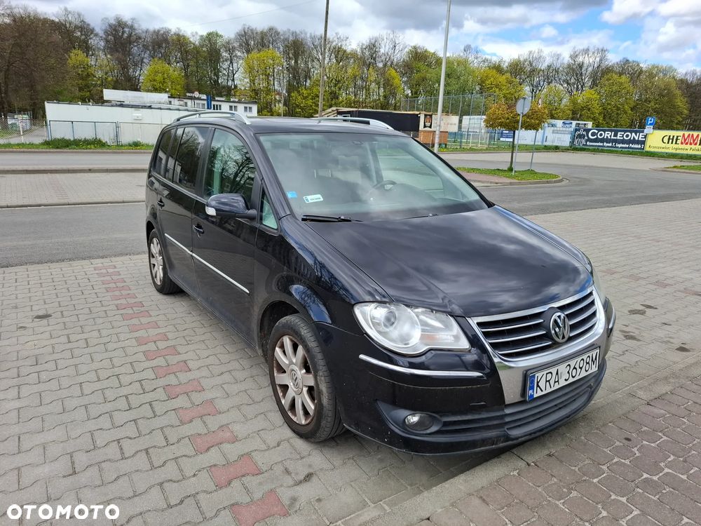 Volkswagen Touran 1.9 TDI DPF Highline DSG - 1