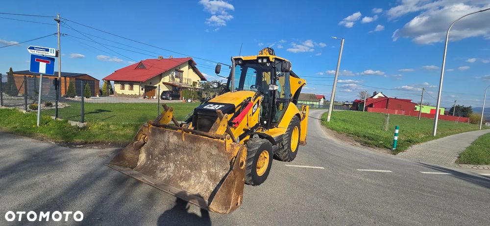 Caterpillar 428 F - 5