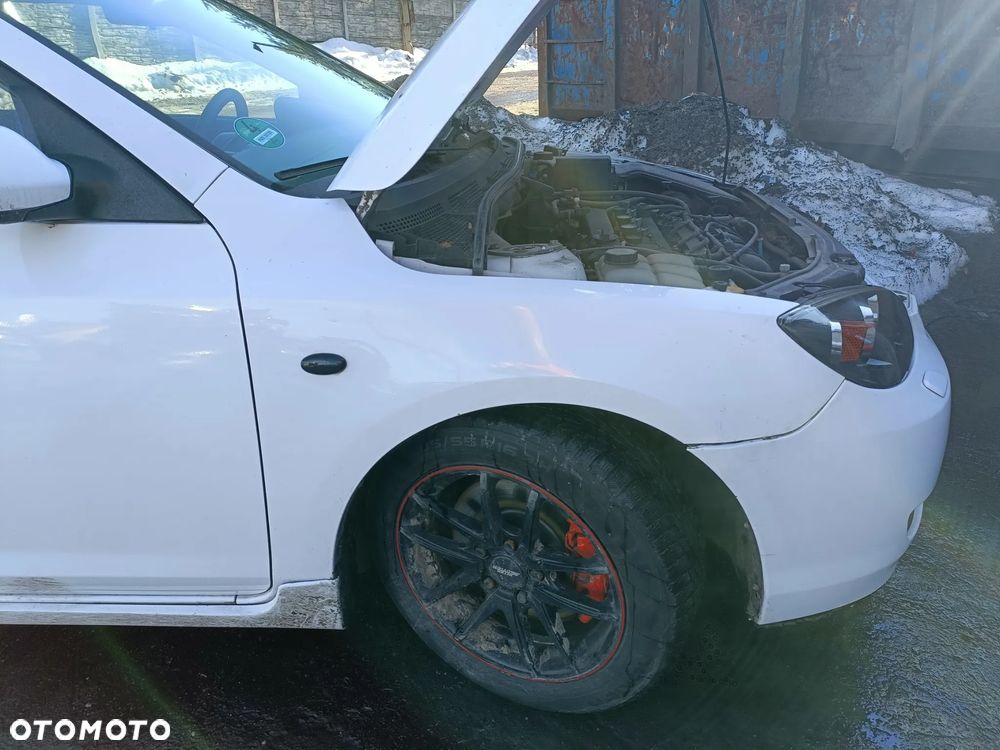 MAZDA 3 I BK 03-06 2005 r. SPORT błotnik prawy przód PP * - 1