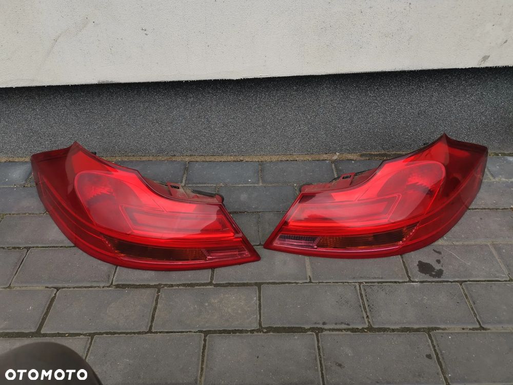 LAMPY PRAWY LEWY TYŁ OPEL INSIGNIA A KOMBII EUROPA