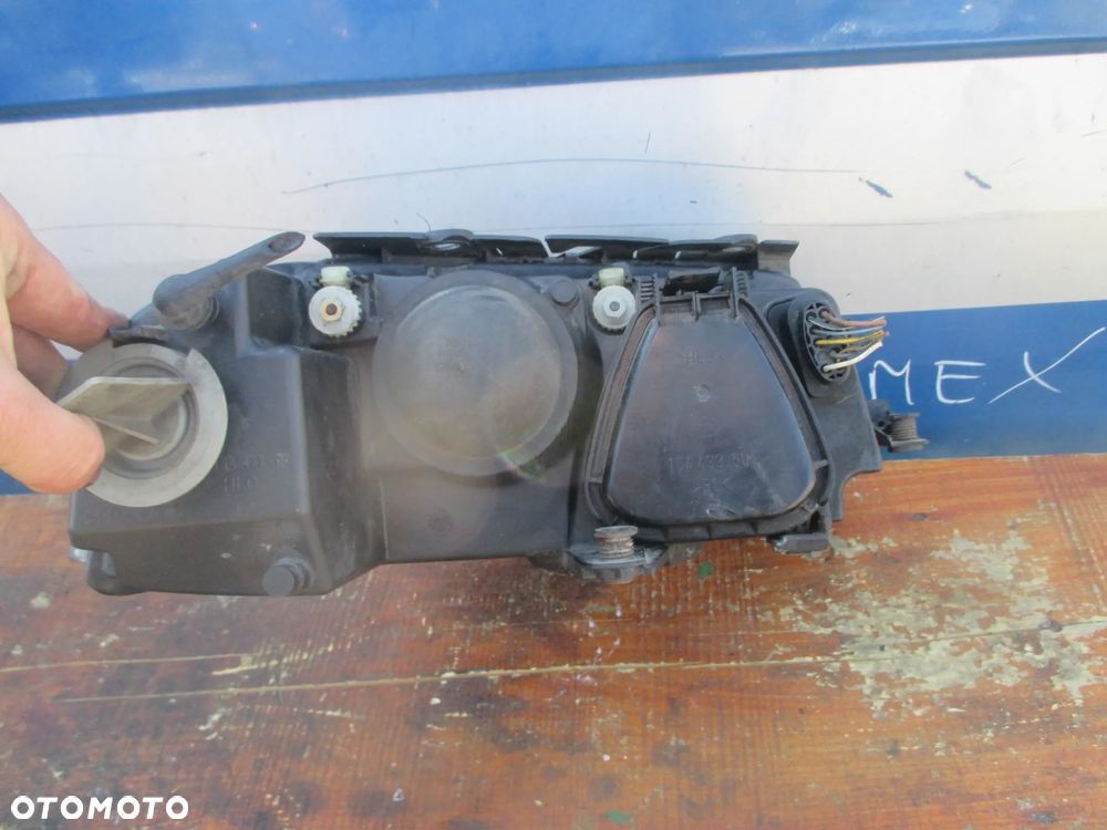 lampa lewa VW Passat B5 lift Hella Europa - 4