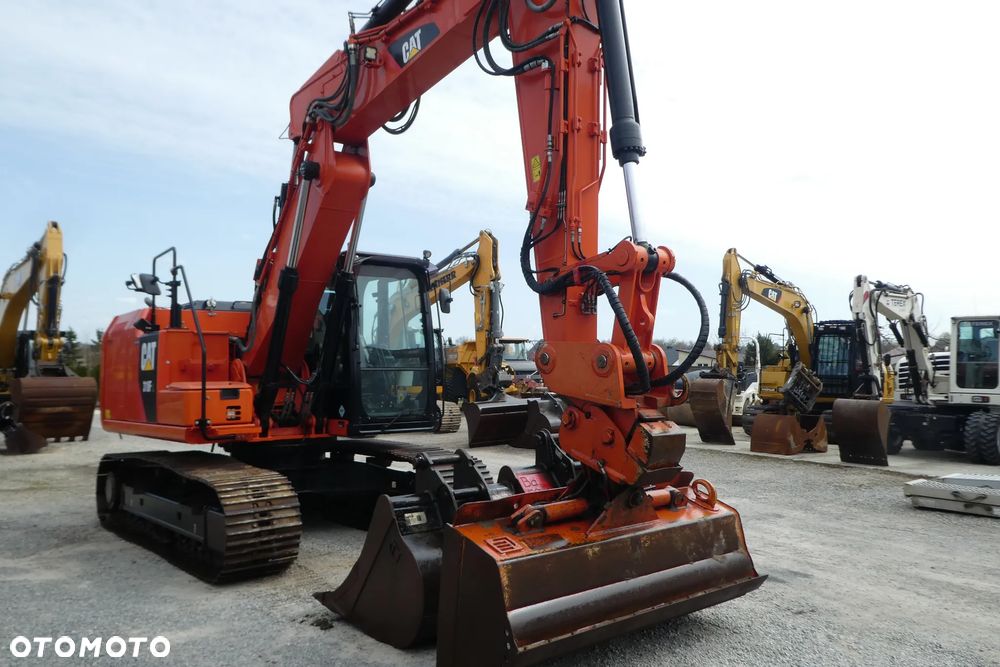 Caterpillar M 318F Z NIEMIEC TRZY ŁYŻKI - 9