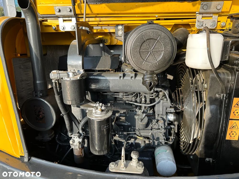 Komatsu PC56 - 16