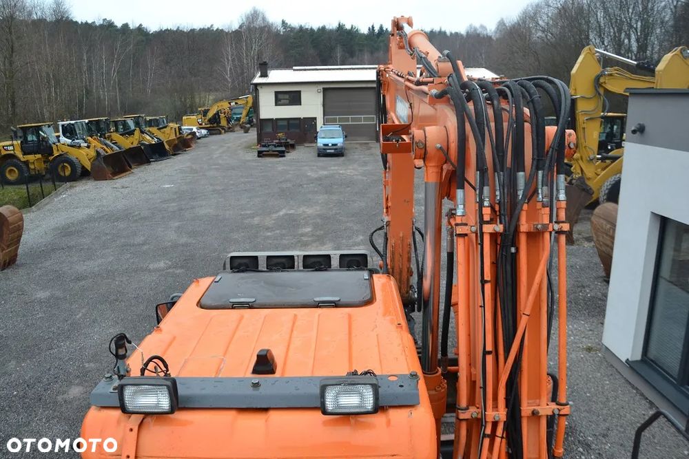 Doosan DX 140 W - 21