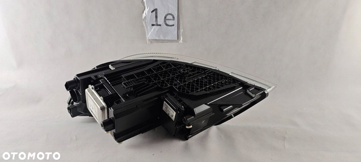 Skoda Octavia II LIFT XENON PRAWY REFLEKTOR LAMPA 1Z1941016G - 9