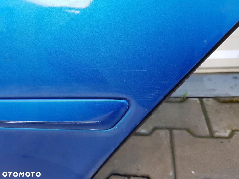 OCTAVIA 2 II 04r- VRS KOMBI DRZWI LEWE TYŁ 9463 - 4