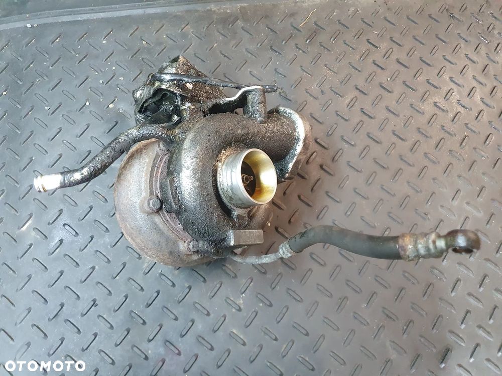 Turbosprężarka BMW E60,61 E65,66,67 2,5d 7791709H  + NASTAWNIK  WP 750080 - 1