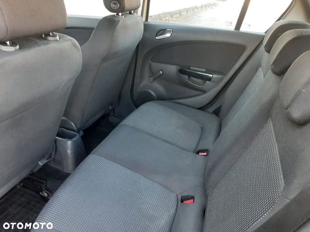 Opel Corsa 1.2 16V Enjoy - 23