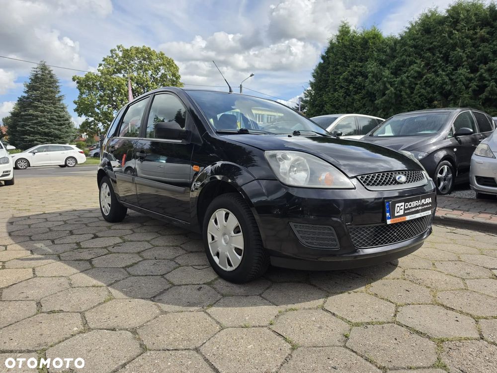 Ford Fiesta 1.4 Ghia - 23