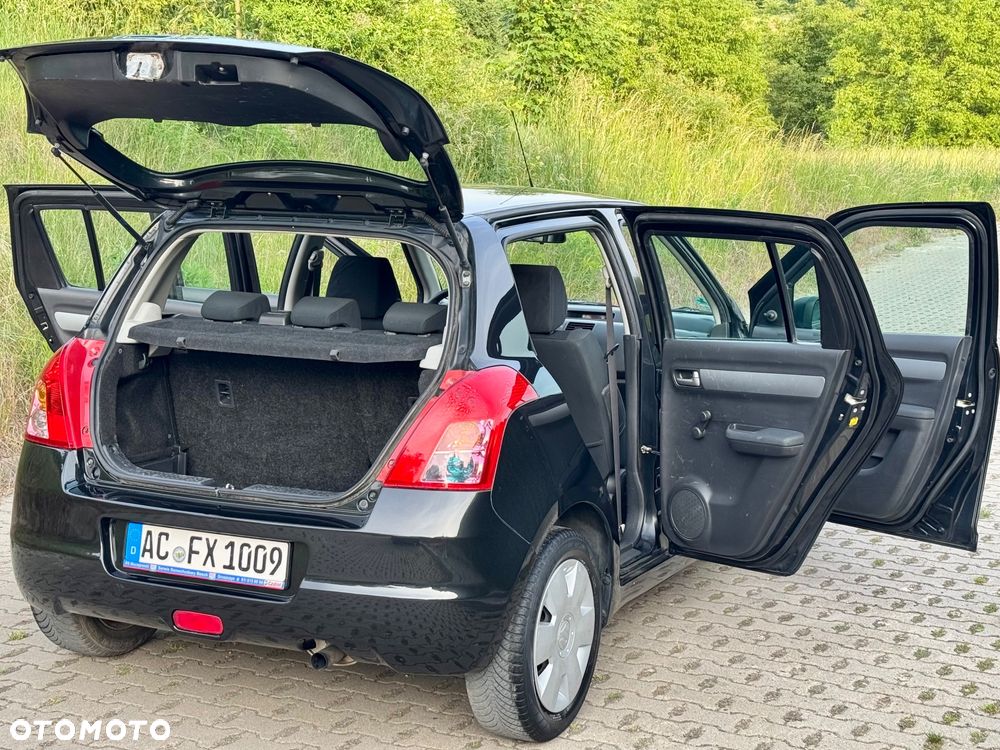 Suzuki Swift 1.3 Comfort - 28