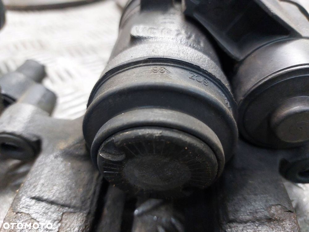 TARCZE HAMULCOWE TYŁ ZACISKI VW PASSAT B8 LIFT 3Q0615405AE 3Q0615406AE - 8