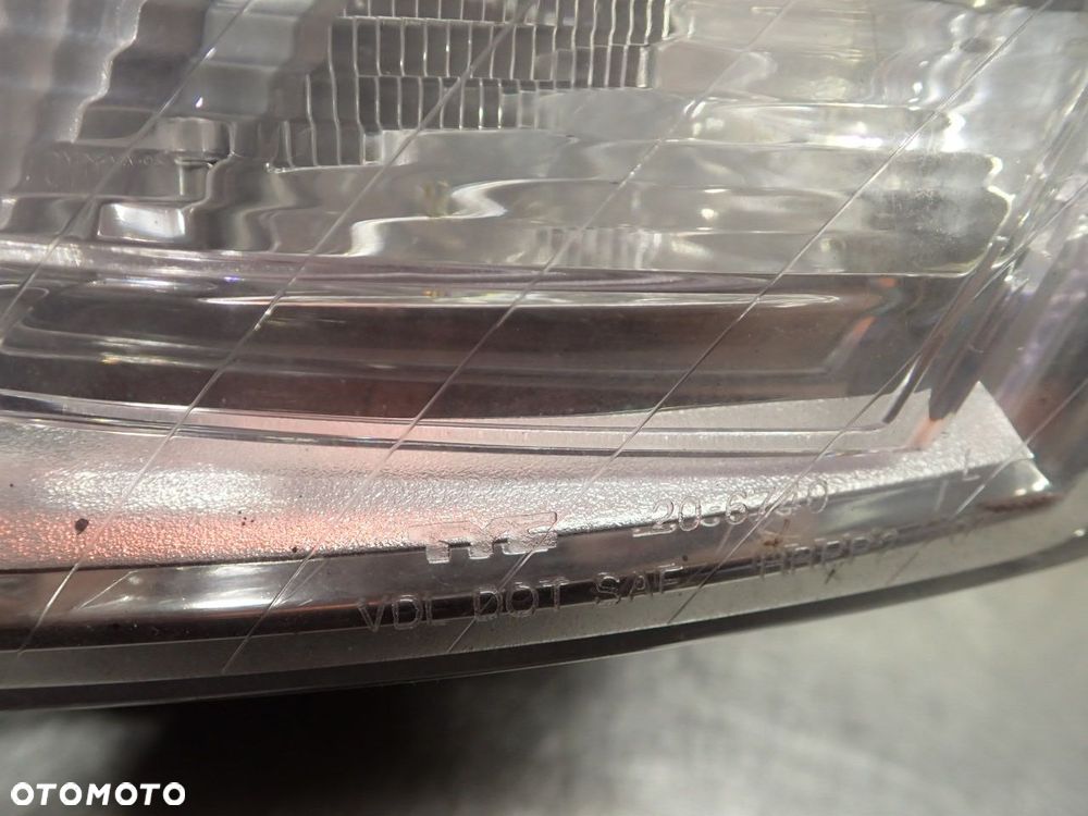 LAMPA LEWA PRZEDNIA TYC VOLKSWAGEN PASSAT B6 - 5