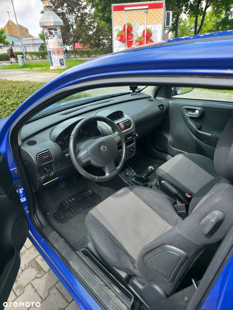 Opel Corsa 1.0 12V Cosmo - 5