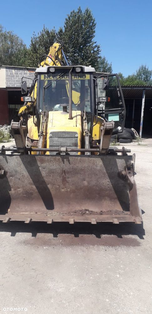 New Holland 110B - 8