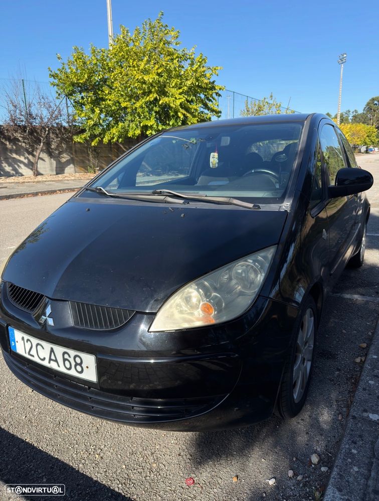 Mitsubishi Colt CZ3 1.1 E-motion - 1