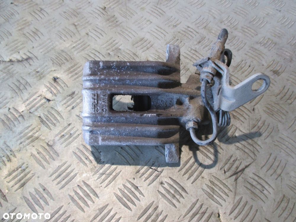 SEAT LEON II ZACISK HAMULCOWY TYŁ PRAWY TYLNY 1.9TDI - 1