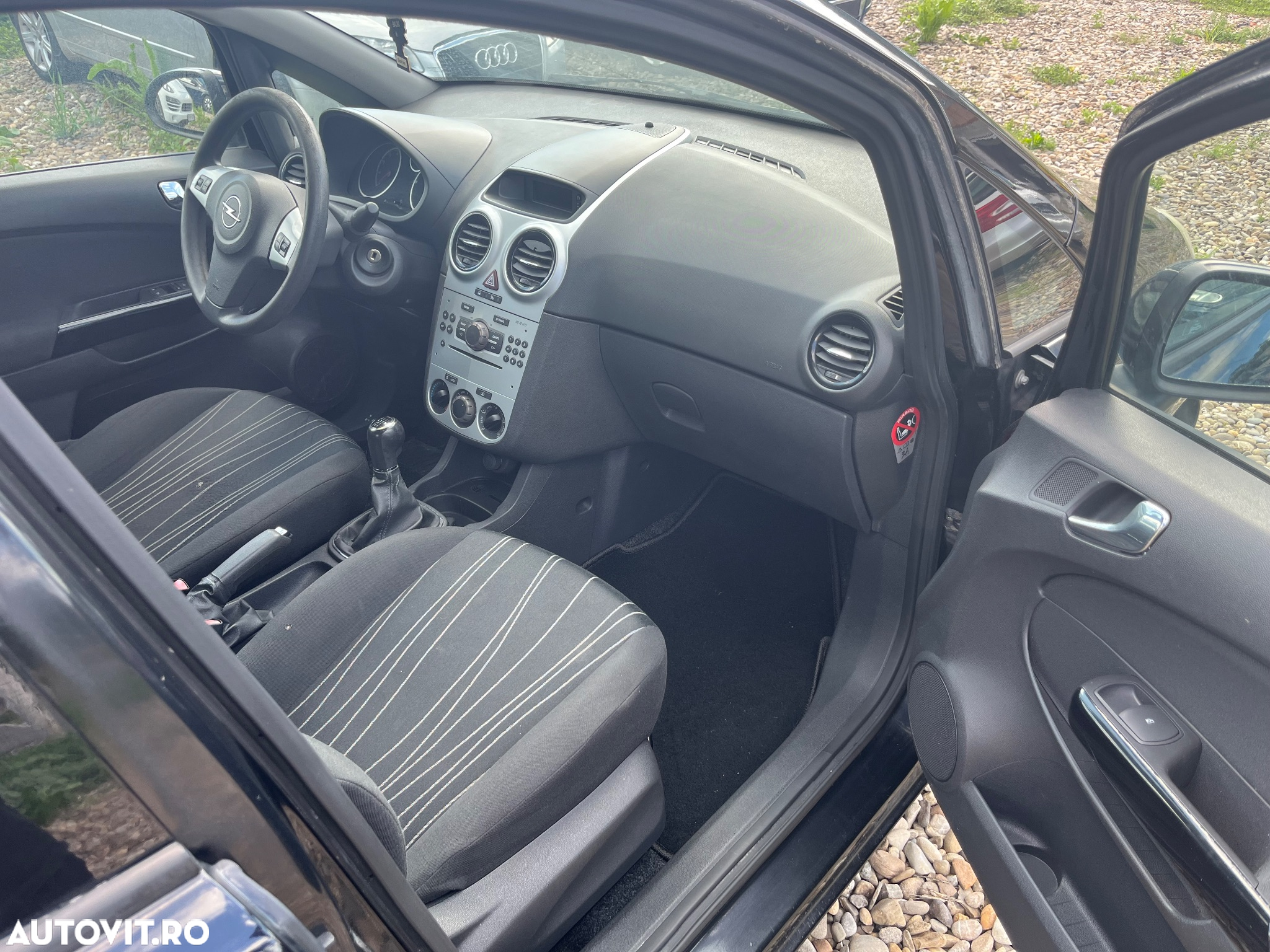 Opel Corsa 1.2i Enjoy - 12