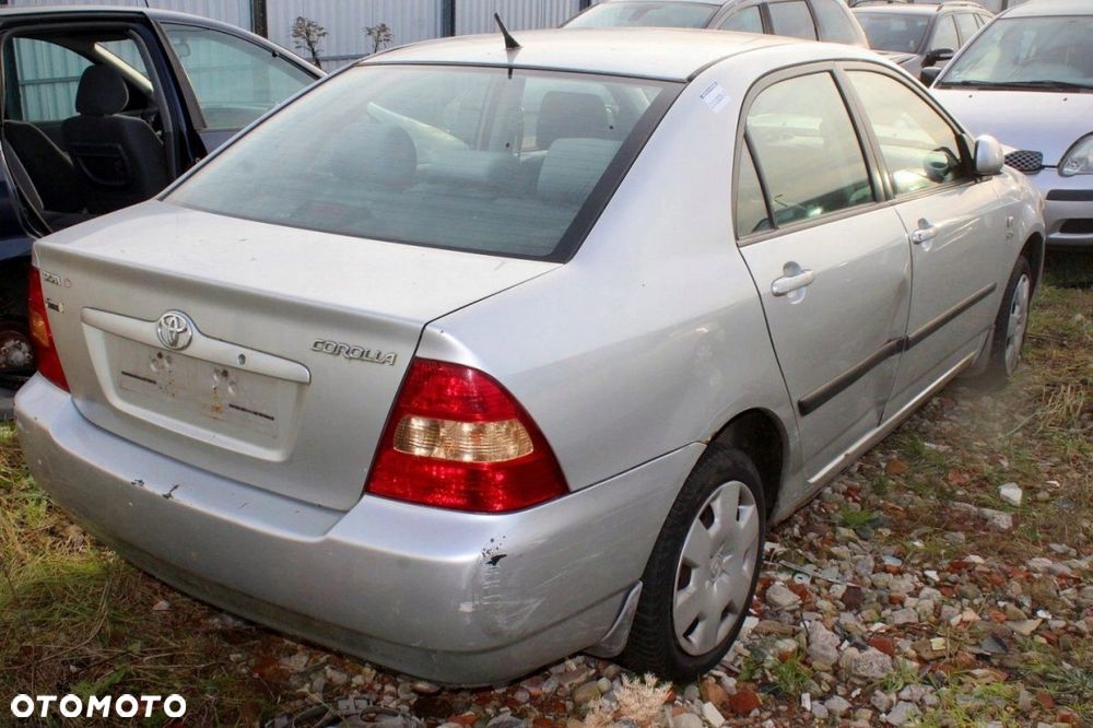 Toyota Corolla E12 fotel lewy przód 5D - 8