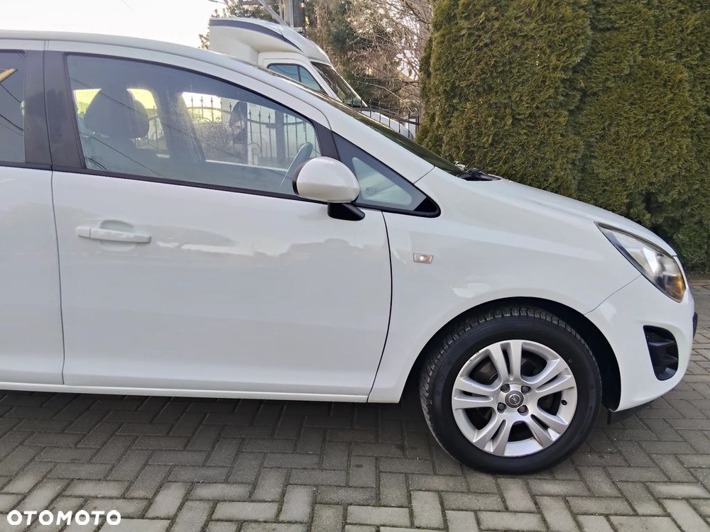 Opel Corsa 1.2 16V Enjoy - 11