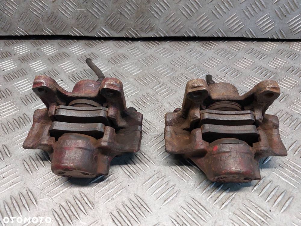 TARCZE HAMULCOWE TYŁ + ZACISKI MERCEDES W210 E200  2.3 - 4