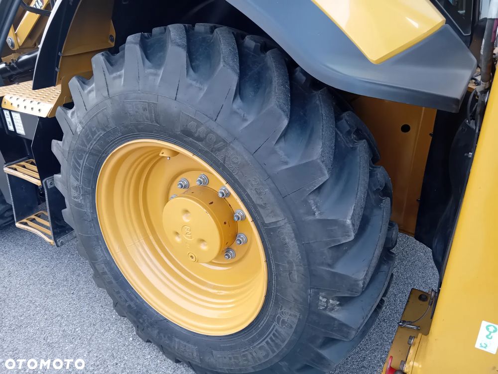 Caterpillar 444 - 9