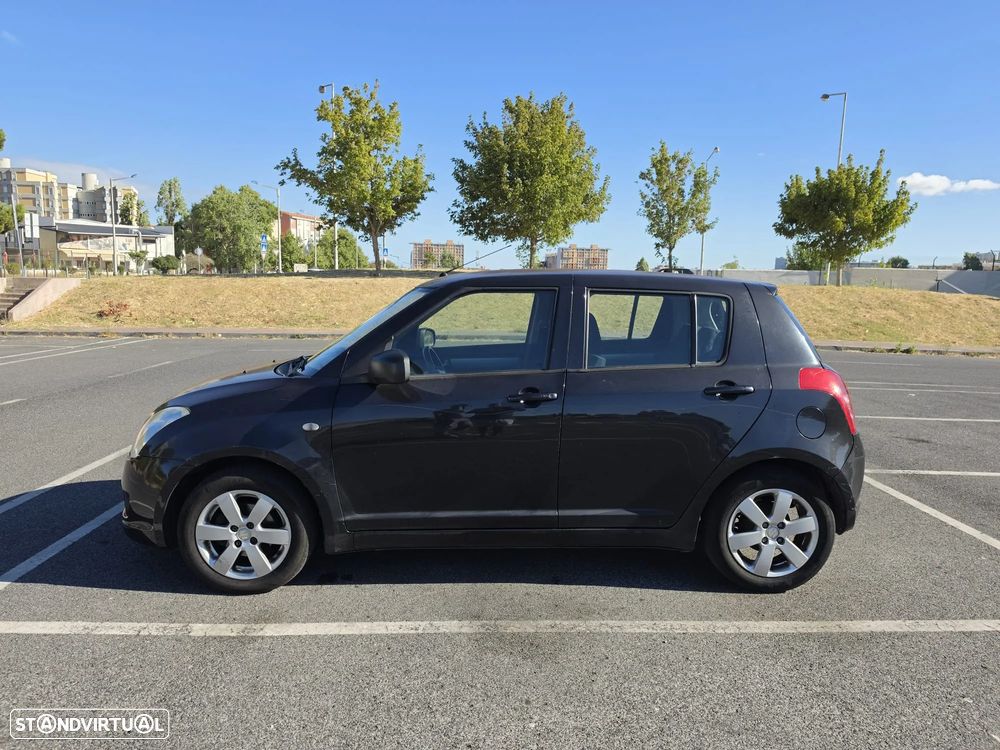 Suzuki Swift 1.3 16V GL - 13