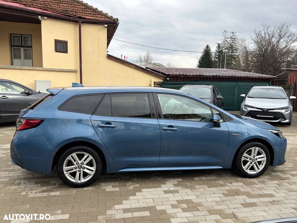 Toyota Corolla 1.8 HSD Business - 30