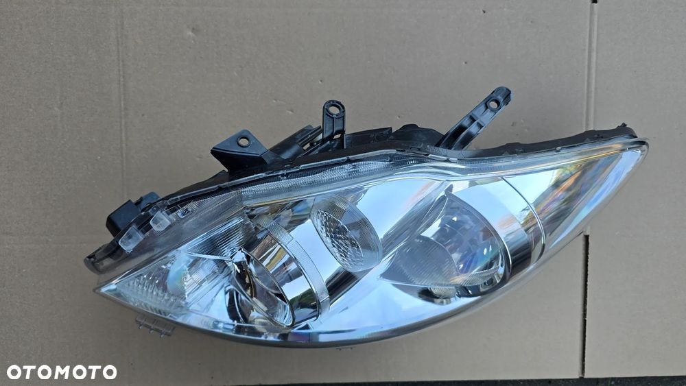 Toyota Auris I Lift 10-12 Lampa Przód Lewa Zwykła Soczewka Oryginał EU Nieklejona - 3