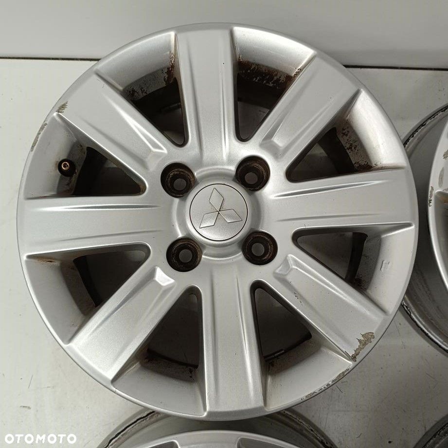 Alufelgi 4x114,3 15 Mitsubishi Colt 4250A756 4szt (F7882) - 5