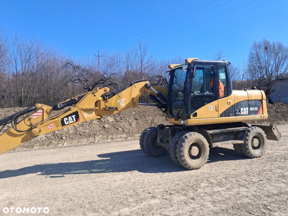 Caterpillar M313D - 1